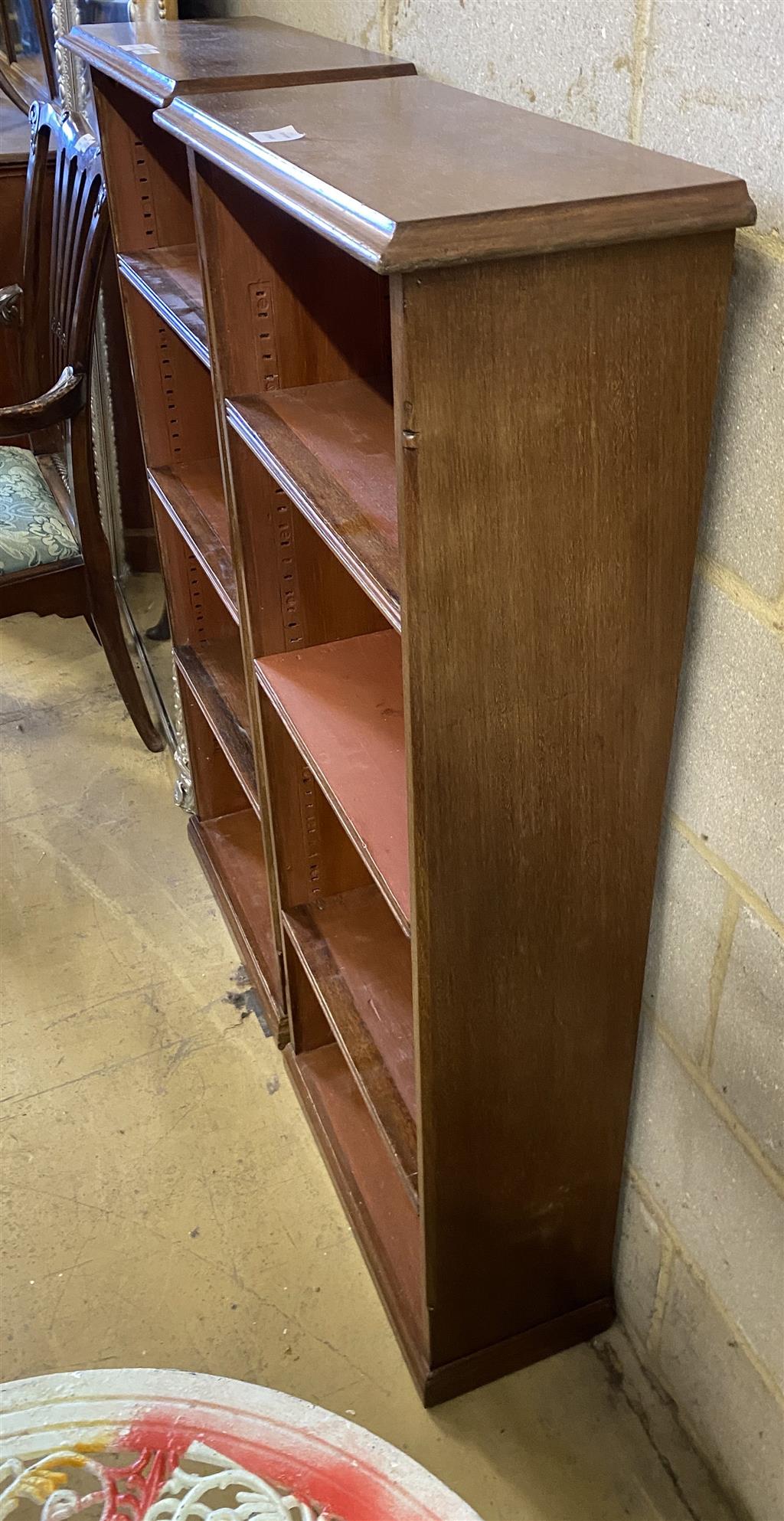 A pair of mahogany open fronted bookcases, width 53cm, depth 24cm, height 120cm